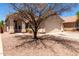 Charming single-story home featuring a two-car garage and covered front porch at 4942 W Novak Way, Laveen, AZ 85339
