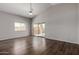 Bright living area with a sliding glass door and modern flooring at 4942 W Novak Way, Laveen, AZ 85339