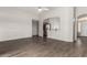 Bright living room showcasing an open layout, archways, and modern flooring at 4942 W Novak Way, Laveen, AZ 85339
