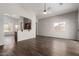 Open-concept living area with a ceiling fan and modern flooring at 4942 W Novak Way, Laveen, AZ 85339