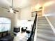 Charming living space with fireplace, staircase, fan and comfortable seating at 500 N Roosevelt Ave # 53, Chandler, AZ 85226