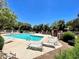Relaxing community pool area with plenty of seating and shade for residents to enjoy at 500 N Roosevelt Ave # 53, Chandler, AZ 85226