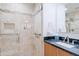 Modern bathroom with a glass enclosed shower and stylish vanity at 5112 N 32Nd Pl, Phoenix, AZ 85018