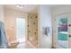 Bathroom with glass shower stall, tiled walls, and a window to the backyard at 5112 N 32Nd Pl, Phoenix, AZ 85018