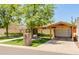This charming single-story home has mature trees, artificial grass and a covered carport at 5112 N 32Nd Pl, Phoenix, AZ 85018