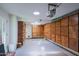 Spacious garage with built-in storage cabinets and a skylight providing natural light at 5112 N 32Nd Pl, Phoenix, AZ 85018