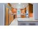 The kitchen features custom cabinets, stainless steel appliances, and a marble tile floor at 5112 N 32Nd Pl, Phoenix, AZ 85018