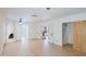 Bright living room with a unique fireplace, French doors, and hardwood floors, offering style and comfort at 5112 N 32Nd Pl, Phoenix, AZ 85018