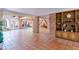 Spacious living area with Saltillo tile flooring, perfect for entertaining at 5112 N 32Nd Pl, Phoenix, AZ 85018
