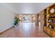 Bright and airy living room with fireplace and views of the pool at 5112 N 32Nd Pl, Phoenix, AZ 85018