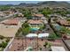Sprawling backyard featuring a pool, playground, and sports court, perfect for outdoor fun at 5320 W Soft Wind Dr, Glendale, AZ 85310