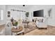 Comfortable living room featuring neutral colors, tile floors and modern decor at 5320 W Soft Wind Dr, Glendale, AZ 85310