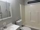 Bright bathroom featuring a shower and bathtub combo, toilet, vanity, and medicine cabinet at 5933 E Main St # 1, Mesa, AZ 85206