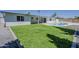 Spacious backyard featuring a sparkling pool, perfect for outdoor gatherings and summer fun at 727 N Beverly --, Mesa, AZ 85201