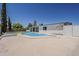Lush backyard with a pristine pool and ample space, perfect for outdoor activities and relaxation at 727 N Beverly --, Mesa, AZ 85201