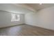 Bedroom featuring wood-look flooring and bright, natural light at 727 N Beverly --, Mesa, AZ 85201
