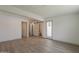 Spacious bedroom with wood-look flooring, and multiple entryways at 727 N Beverly --, Mesa, AZ 85201