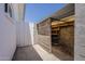 Storage area with shelving, and protected with a metal security gate, offers secure outdoor space at 727 N Beverly --, Mesa, AZ 85201