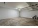 Large garage space with concrete flooring, ample room for vehicles and other belongings at 727 N Beverly --, Mesa, AZ 85201