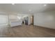 Spacious kitchen featuring white cabinets, marble countertops, and stainless steel appliances at 727 N Beverly --, Mesa, AZ 85201