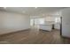 Spacious living area featuring new wood flooring, recessed lighting, and an open layout at 727 N Beverly --, Mesa, AZ 85201