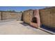 Close-up of block-wall and brick fireplace in the backyard patio at 727 N Beverly --, Mesa, AZ 85201