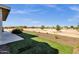 Backyard featuring desert landscaping, artificial turf, and scenic views at 856 W Quail Cir, San Tan Valley, AZ 85143