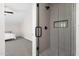 Bathroom with a modern glass enclosed shower and stylish gray tiling at 856 W Quail Cir, San Tan Valley, AZ 85143