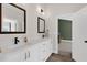 Bathroom with double sinks and marble countertops at 856 W Quail Cir, San Tan Valley, AZ 85143