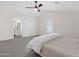 Serene bedroom with an ensuite bathroom and a shuttered window letting in sunlight at 856 W Quail Cir, San Tan Valley, AZ 85143