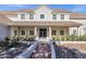 Attractive home exterior with a welcoming front entrance and manicured garden at 856 W Quail Cir, San Tan Valley, AZ 85143