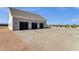 Three-car garage with large concrete driveway offers ample parking for your vehicles at 856 W Quail Cir, San Tan Valley, AZ 85143