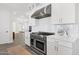 Modern kitchen with stainless steel appliances and granite countertops at 856 W Quail Cir, San Tan Valley, AZ 85143