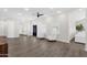 Bright and airy living room with sleek floors and a ceiling fan at 856 W Quail Cir, San Tan Valley, AZ 85143