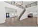 Open-concept design with high ceilings that flows into a kitchen and entry at 856 W Quail Cir, San Tan Valley, AZ 85143