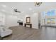 Spacious living room with modern finishes and an elegant chandelier at 856 W Quail Cir, San Tan Valley, AZ 85143
