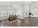 Spacious open-concept living area with hardwood floors and soaring vaulted ceilings at 856 W Quail Cir, San Tan Valley, AZ 85143