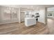 Contemporary kitchen with a center island, stainless steel appliances, and eat in dining area at 1073 N 159Th Dr, Goodyear, AZ 85338