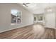 Light-filled living room with vaulted ceiling and arched windows at 1073 N 159Th Dr, Goodyear, AZ 85338