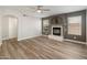 Comfortable living area boasts modern floors and a charming fireplace feature at 1073 N 159Th Dr, Goodyear, AZ 85338
