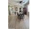 Charming dining room featuring wood floors and a classic dining set for Gathering meals at 1075 E Crimm Rd, San Tan Valley, AZ 85143