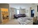 Cozy living room with a plush sectional sofa, leading to a laundry room for added convenience at 1075 E Crimm Rd, San Tan Valley, AZ 85143