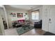 Cozy living room with ample seating, decorative accents, and a welcoming atmosphere at 1075 E Crimm Rd, San Tan Valley, AZ 85143