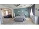 Serene main bedroom suite with a stylish bed, decorative accents, and a calming color scheme at 1075 E Crimm Rd, San Tan Valley, AZ 85143