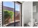 Bathroom features a sliding glass door that leads to the private patio at 10830 N 11Th St, Phoenix, AZ 85020