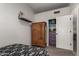 Bedroom features wardrobe and doorway to walk-in closet at 10830 N 11Th St, Phoenix, AZ 85020