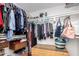Walk-in closet with organized shelving and hanging rods for ample storage space at 10830 N 11Th St, Phoenix, AZ 85020