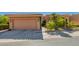 Inviting home exterior with a tile roof, two car garage and well-maintained desert landscaping at 10830 N 11Th St, Phoenix, AZ 85020