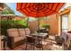 Cozy outdoor patio with comfortable seating, grill, and beautiful desert landscaping at 10830 N 11Th St, Phoenix, AZ 85020