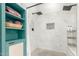 Beautiful shower with dual shower heads, white marble tile, and built-in niche at 10830 N 11Th St, Phoenix, AZ 85020